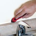 kitschraper die kit gladmaakt